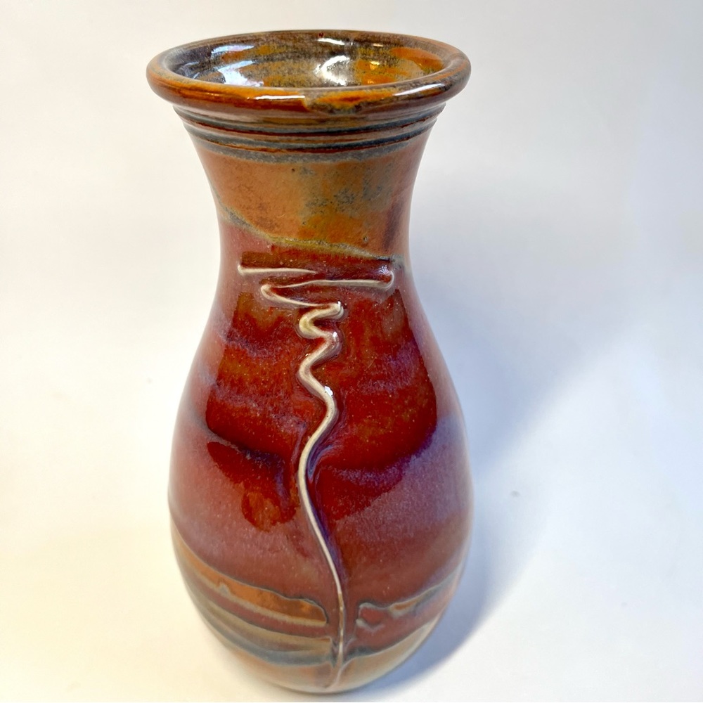 Signed Art Pottery Vase 4 feathers signature on bottom 8 In tall Sunset Colors